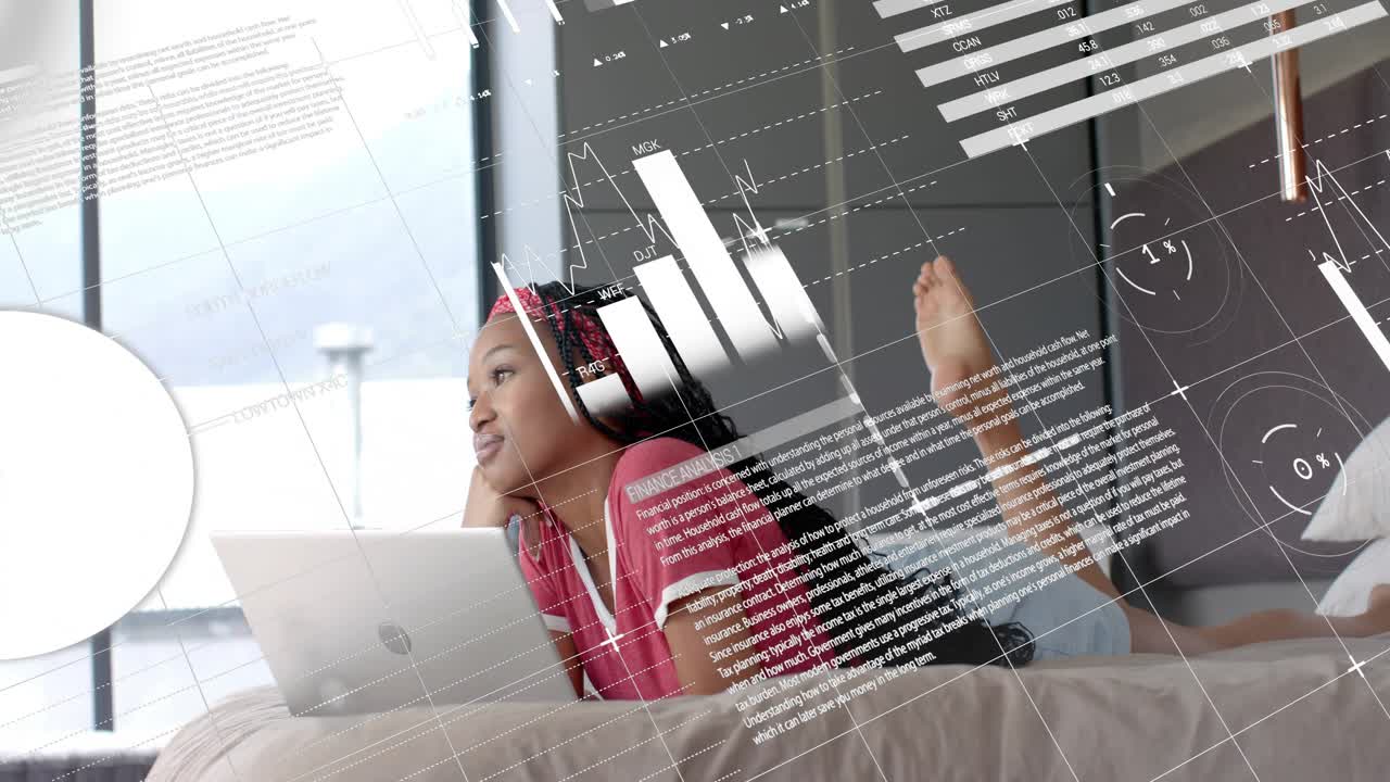 Woman lying on bed using laptop near window, typing and causing charts scrolling for data analysis
