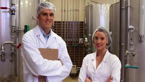 Food-technicians-smiling-at-camera