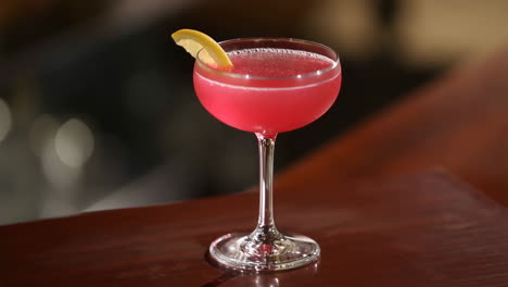 pink cocktail on a bar