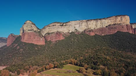 Spectacular aerial view of Vilanova de Sau and Pantano cliffs in Spain on a sunny day