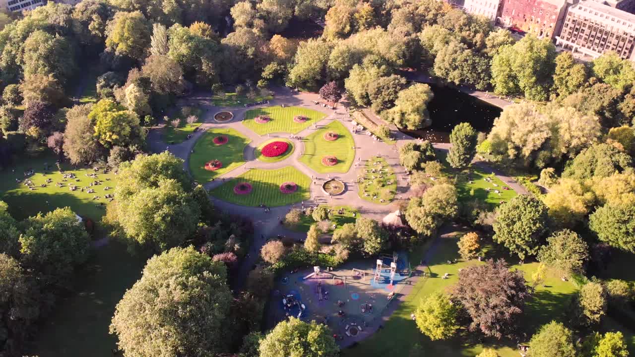 Dubliners enjoying summer sunshine in Dublin famous city park St Stephen's Green - aerial