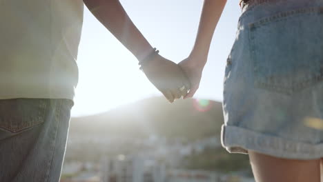 Summer,-love-and-couple-holding-hands-in-the-city
