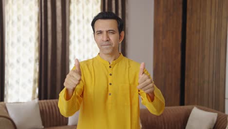 Happy-Indian-man-showing-thumbs-up