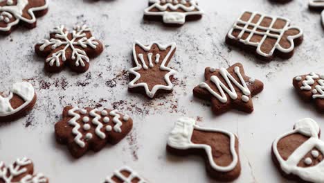 composition of delicious gingerbread cookies shaped in various christmas symbols