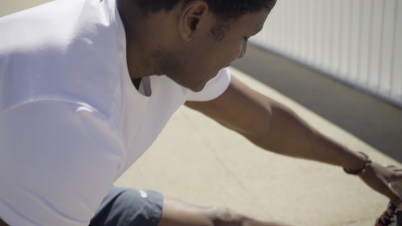 Closeup shot of African American man training outdoor.
