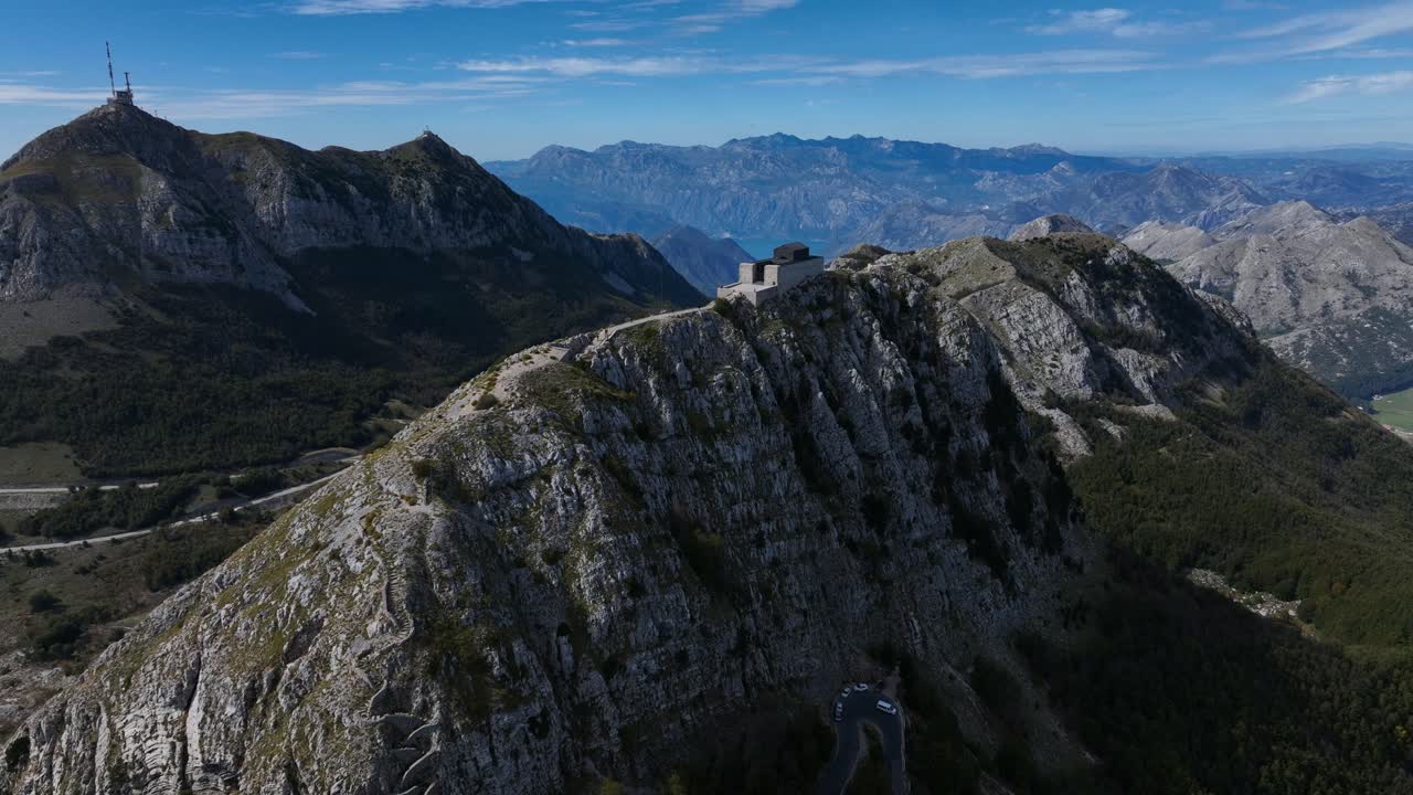 Mountain ridge with a historic building and vast landscape in Lovcen, Montenegro