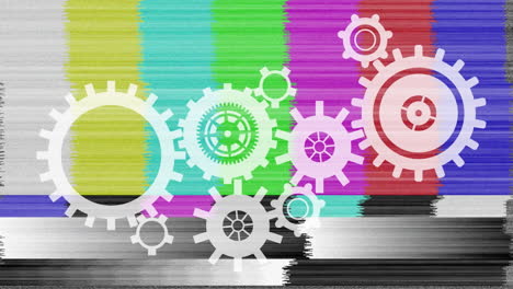 white gears and colorful static