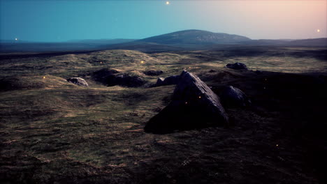 green meadow on the background of the mountains