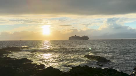 large cruise ship anchored off the coast of hawaii