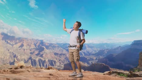 full body side view of asian male hiker with mountaineering backpack screaming goal celebrating the success while traveling at the top of mountain