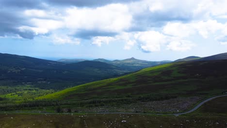 Aerial-Fly-By-over-Dramatic-Green-Mountains-of-Ireland