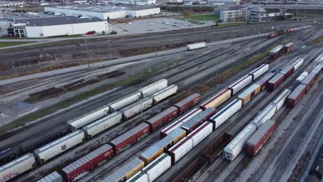 aerial drone shot as a train drives into station