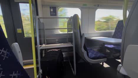interior uk train ride view luggage rack