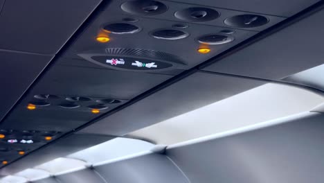 airplane cabin interior with safety lights