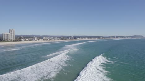 Foamy-Ocean-Waves-At-Palm-Beach-In-Gold-Coast,-Queensland,-Australia---aerial-drone-shot