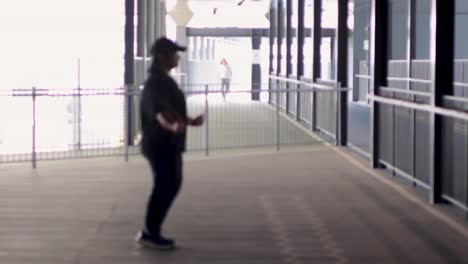 person performs a skipping rope exercise indoors