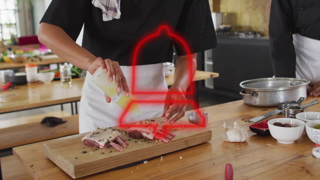 Seasoning meat with herbs, chef preparing dish with animation overlay in kitchen