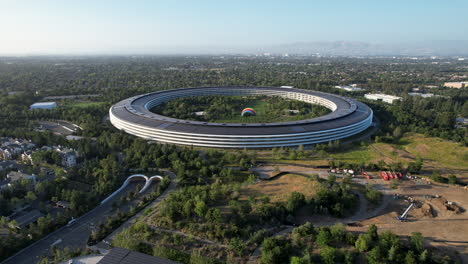 apple park futuristic circular headquarters in cupertino san jose california with scenic surrounding landscape from an aerial drone