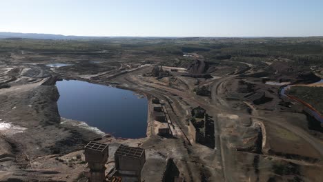 abandoned copper mine buildings and flooded areas in the sao domingo mine area, portugal