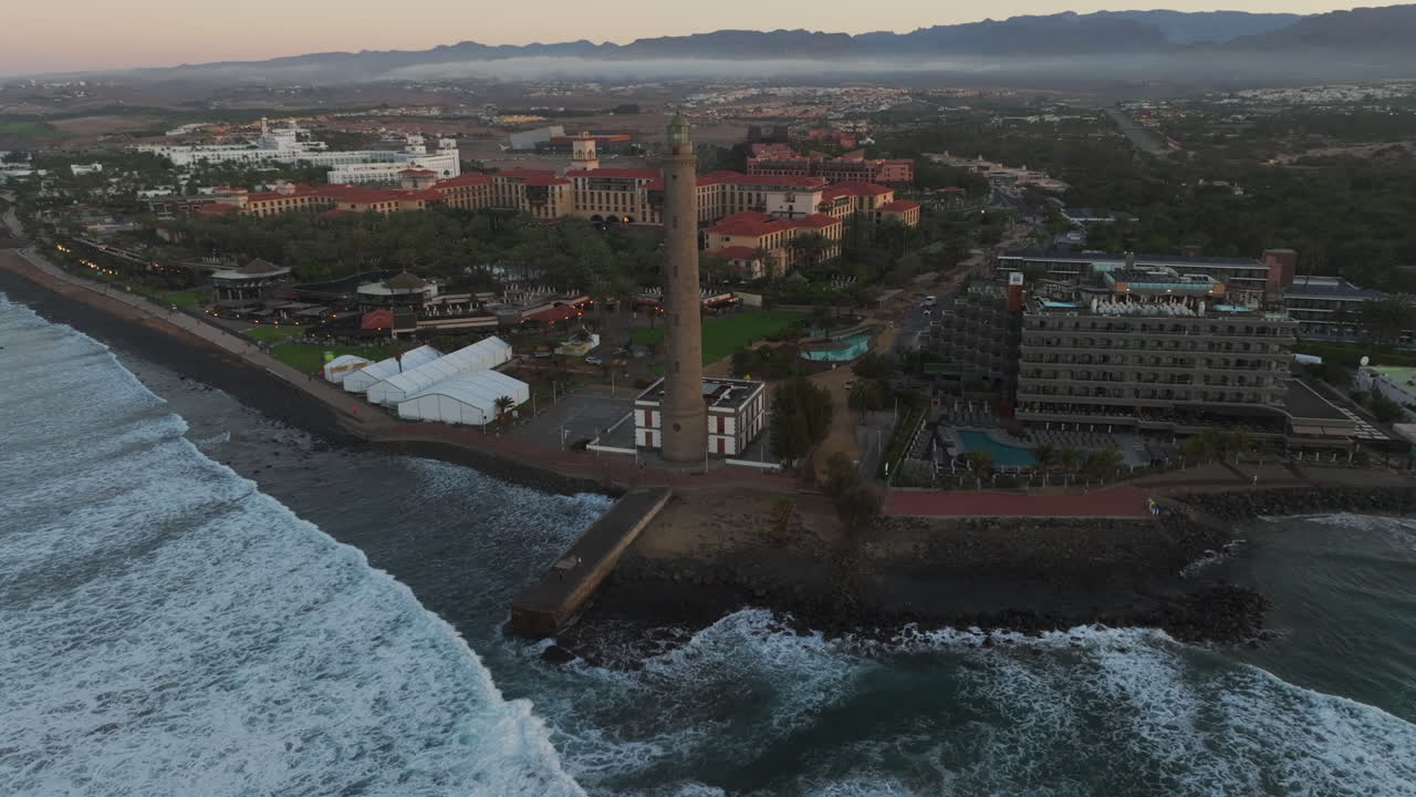 Awakening in Gran Canaria's Nature: Aerial View of Maspalomas Lighthouse at Sunrise