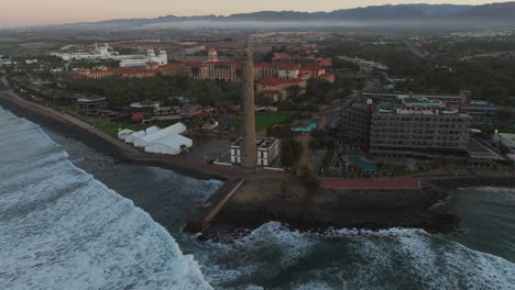 Awakening-in-Gran-Canaria's-Nature:-Aerial-View-of-Maspalomas-Lighthouse-at-Sunrise