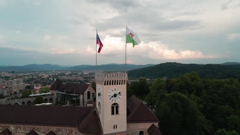 ljubljana, slovenia, city castle grad. flags on the wind, proud patriotic image