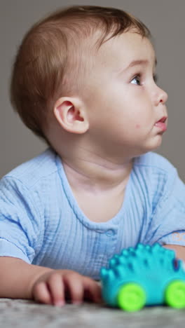 baby playing with a toy