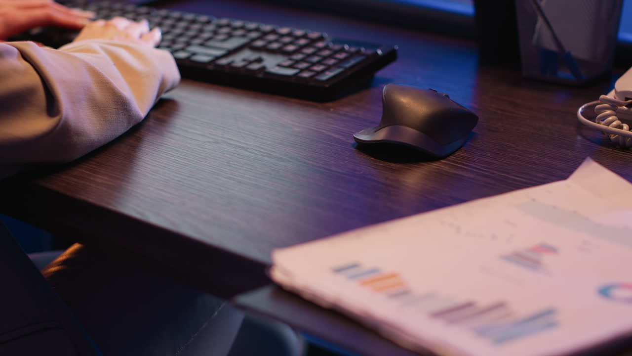 Working at a desk with keyboard and mouse