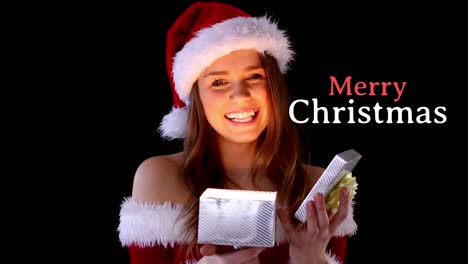 Feliz-Navidad-Texto-Y-Santa-Vestida-Hermosa-Mujer-Abriendo-Regalo