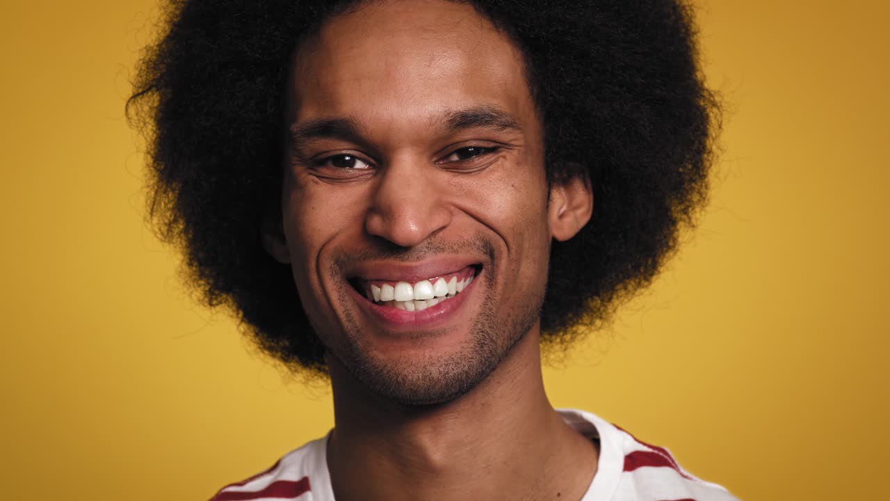 Close up portrait of very happy African man