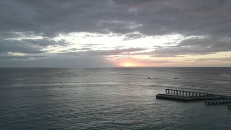 Cloudy-sunset-sky-over-endless-rippling-sea