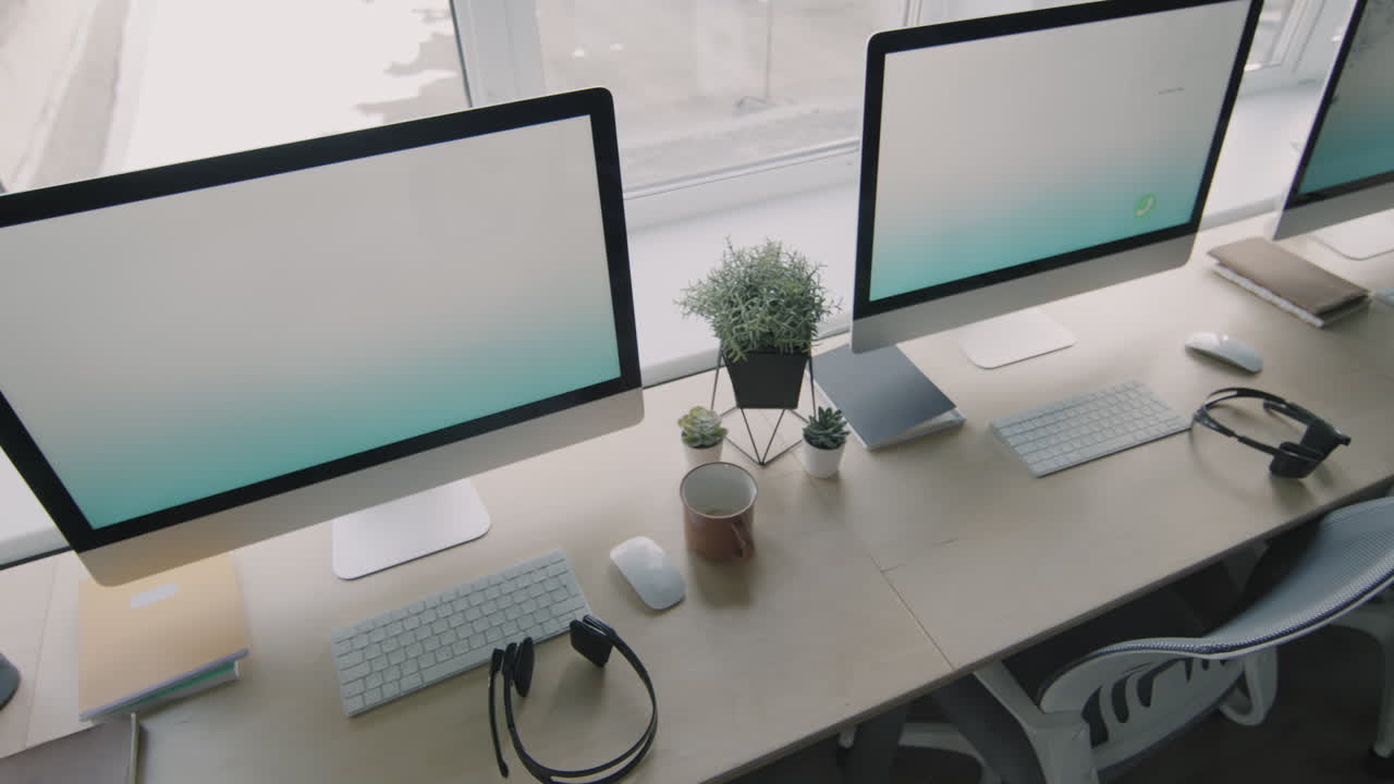 Modern Office Workspace with Multiple Monitors