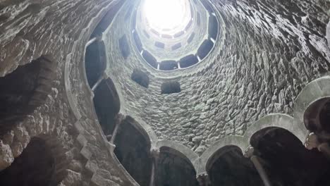 circular stone mosaic in quinta da regaleira, sintra, portugal, showcasing intricate geometric patterns