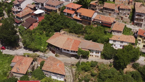 drone shot of veliko tarnovo red tiled roofed buildings and narrow streets