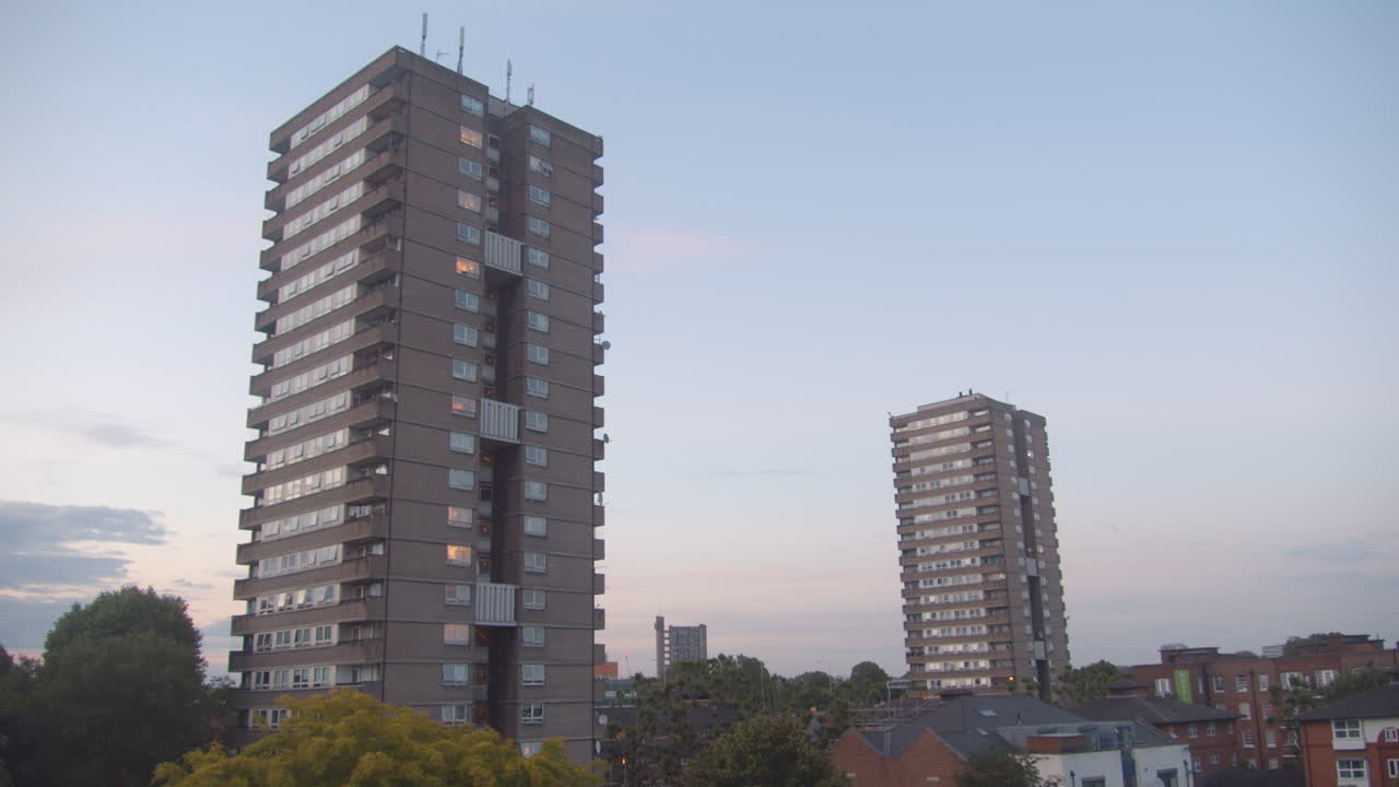 Two High Rise Apartment Buildings at Dusk