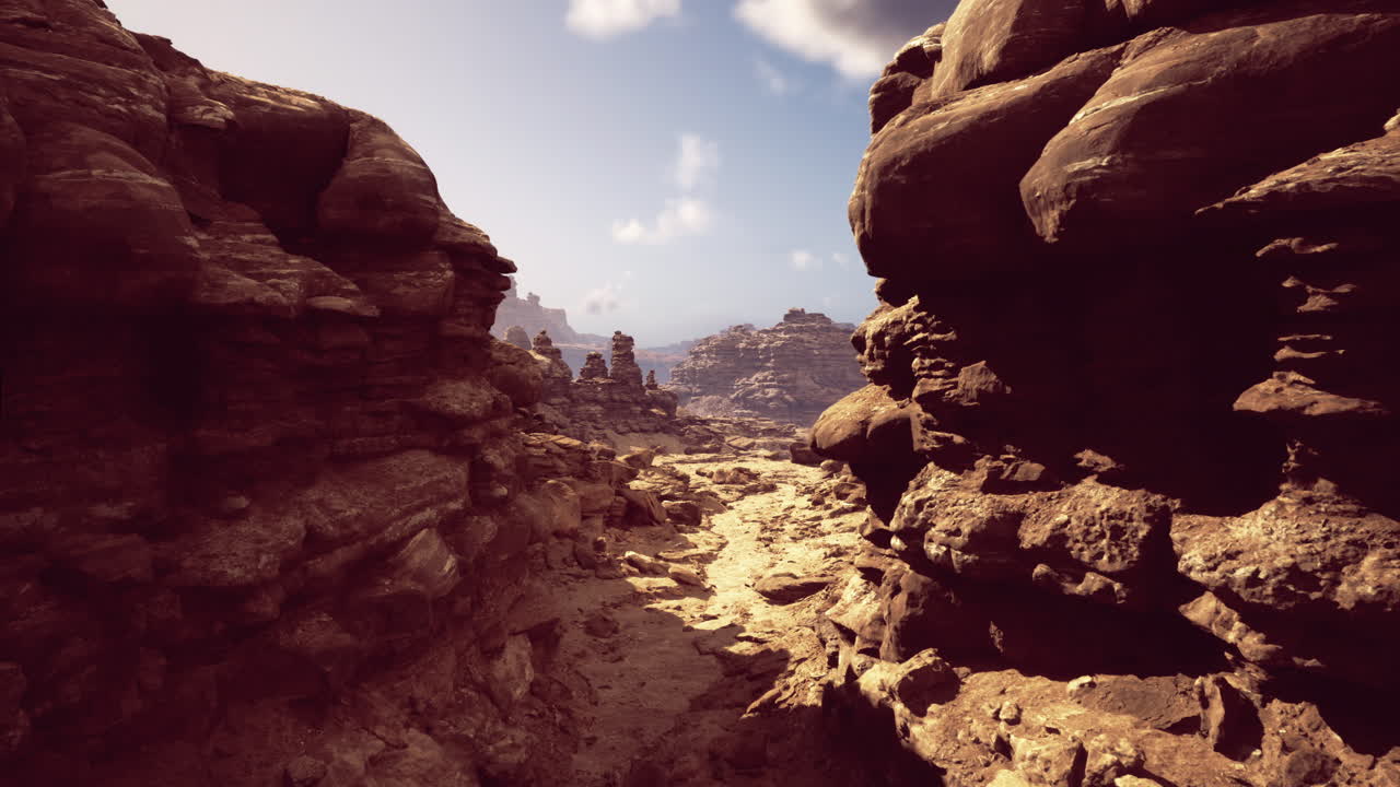 Discovering unique rock formations through a natural archway in the desert