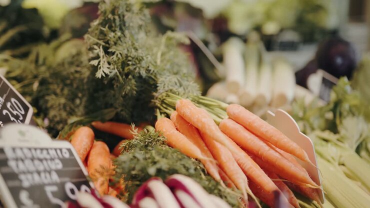 Close view of carrots on a grocery store