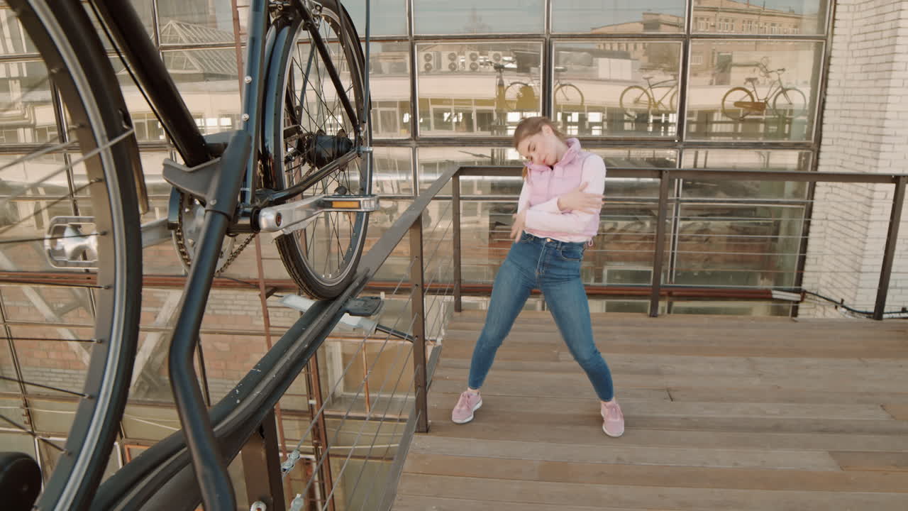 Young Woman Dancing on Roof Terrace