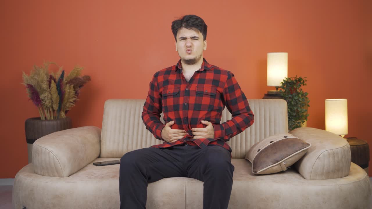 Man with stomachache.