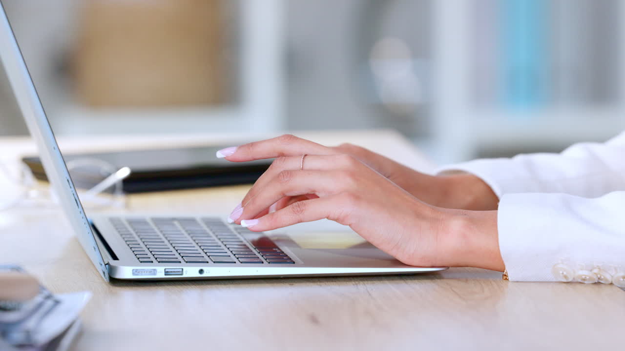 Beautiful nails closeup of hands typing