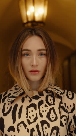 woman wearing leopard print coat