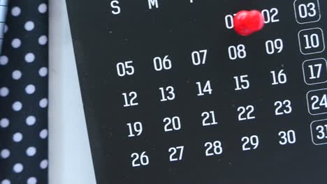 calendar with a red pin