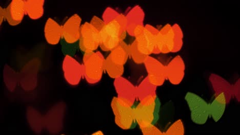 Hermoso-Bokeh-En-Forma-De-Mariposa-De-Luces-LED-Intermitentes,-Verano,-Primavera,-Concepto-De-Fondo-De-Vacaciones,-Espacio-De-Copia