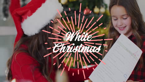 animation of white christmas text over caucasian woman and daughter wearing santa hats