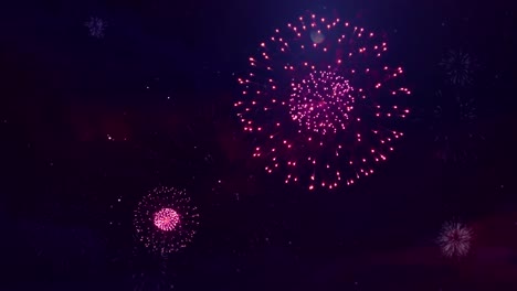 blue big shiny fireworks bokeh lights in the night sky firework show loop animation background