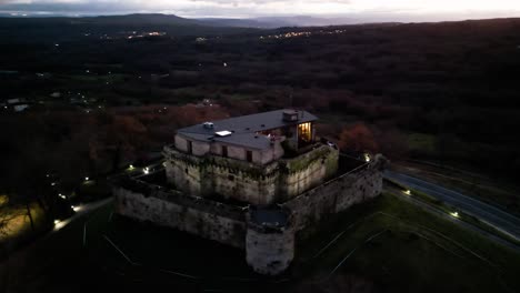 orbit around old historic walls of maceda castle in ourense spain in the evening