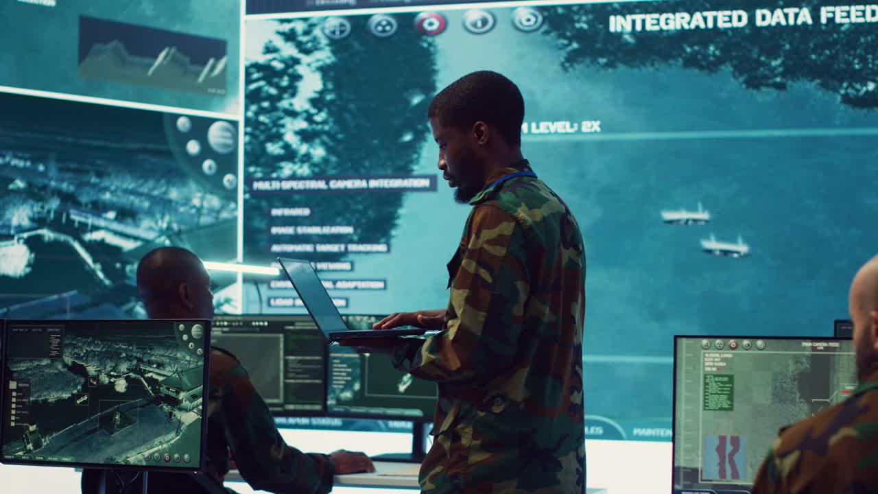 Army officer examines satellite radar footage to gather intelligence