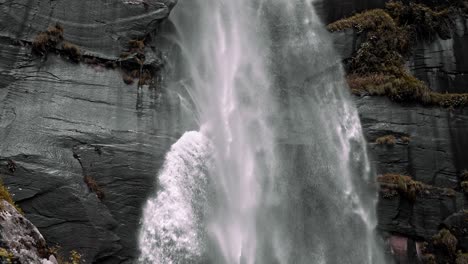 amazing view of a powerful flowing of water from jogini falls - tourist attraction in vashisht, himachal pradesh, india