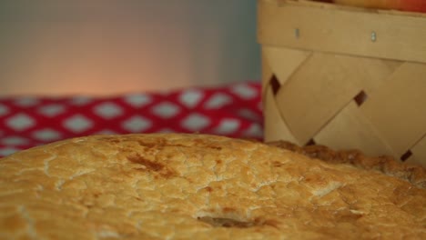 delicious apple pie pie on a red and white checkered cloth