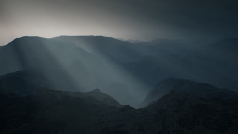 black-rocky-mountain-silhouette-in-deep-fog